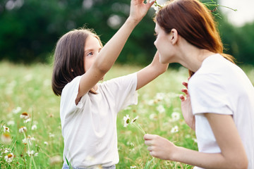 mother and daughter having fun in the park