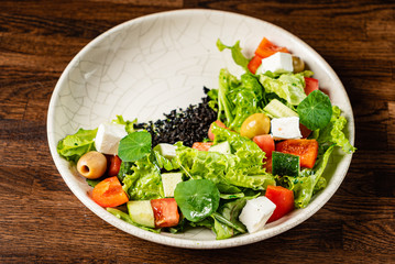 greek salad on the white plate