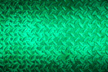 Green metal non slip surface background.