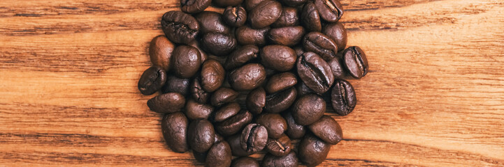 A cup of coffee and scattered coffee beans. Layout. Flat lay. Coffee bean.