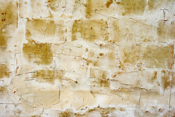 Texture of a concrete wall with cracks and scratches which can be used as a background
