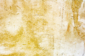 Texture of a concrete wall with cracks and scratches which can be used as a background