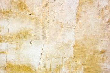 Texture of a concrete wall with cracks and scratches which can be used as a background