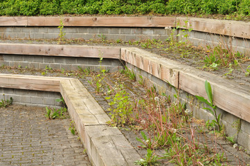 large steps of wood and sett stones in a park