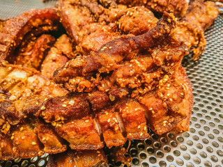 Fried pork is sold at a local Thai restaurant.1