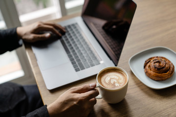 Fototapeta na wymiar Man Computer Laptop Coffee Cafe Concept