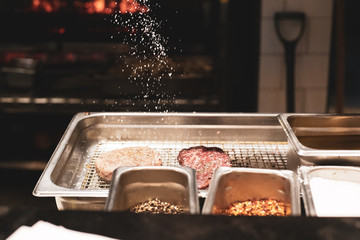 chef seasoning meat