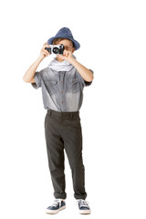 Cute little photographer with professional camera on white background