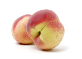 ripe peach on white background