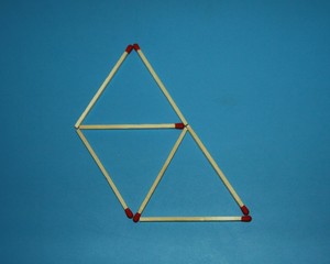 Wooden matches logic puzzle task geometric shape