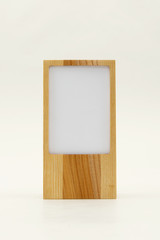 a small frame of wood that can be placed on a desk.