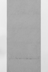 Clean concrete column in front of white background