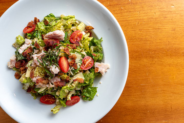 Chopped Green Salad Romaine with Bacon, Tomatoes, Turkey, Basil, Parmesan, Green Beans and Balsamic Dressing