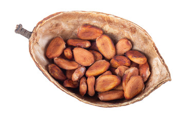dried cacao pod half  with cacao beans isoalted on white. top view