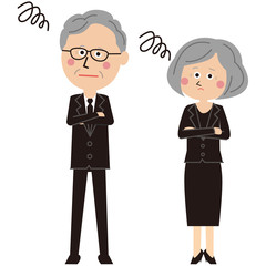 ポップな黒いスーツを着たシニアの男女が困る