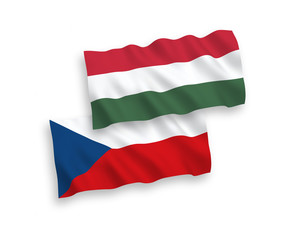 National vector fabric wave flags of Czech Republic and Hungary isolated on white background. 1 to 2 proportion.