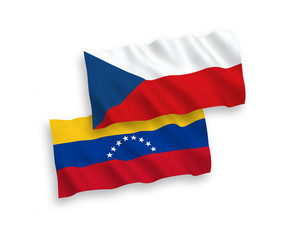 National vector fabric wave flags of Venezuela and Czech Republic isolated on white background. 1 to 2 proportion.