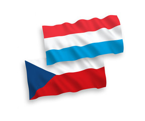 National vector fabric wave flags of Czech Republic and Luxembourg isolated on white background. 1 to 2 proportion.