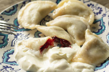 cherry dumplings on a plate