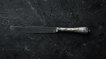 Old knife Cutlery. Top view. Free space for your text.