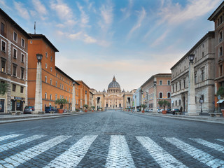 Fototapeta na wymiar wide angle view through pedestrian to Cathedral of Saint Peter in Rome