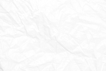 Crumpled, Wrinkled of white paper fabric texture background with empty space for typing text.