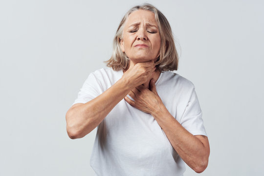 Portrait Of Senior Woman With Hands On Hips