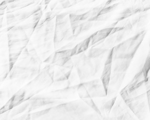 White fabric texture background. Wrinkled, crumpled fabric.