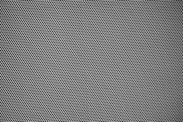 Small black dots that look at the be dazzled of many black dots of metal plates.