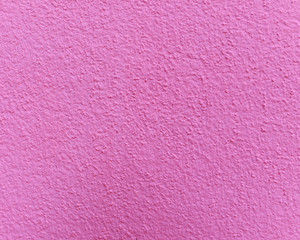 Pink cement or concrete wall texture for background. High resolution through process retouch.