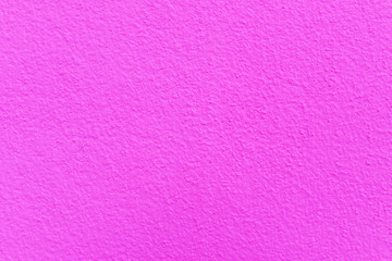 Pink cement or concrete wall texture for background. High resolution through process retouch.