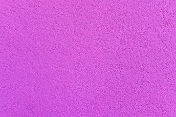 Pink cement or concrete wall texture for background. High resolution through process retouch.