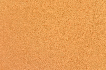 Orange cement or concrete wall texture for background, Empty space.