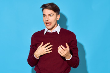 portrait of young man with arms crossed
