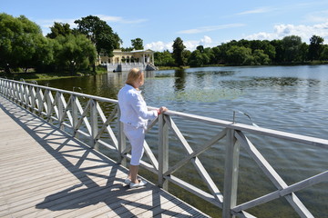 Fototapeta premium young girl on the bridge