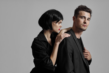 portrait of young man and woman