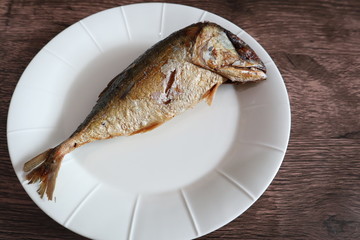 Fried Mackerel on White Dish 