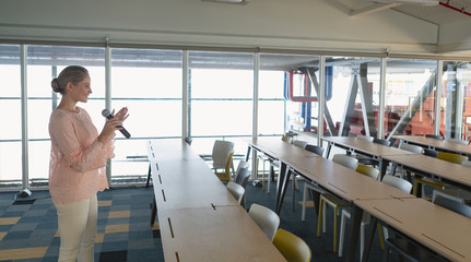 Female executive practicing her speech in the conference room