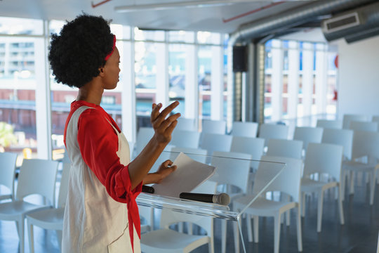 Female executive practicing her speech in the conference room