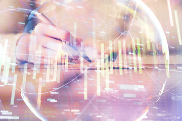 International business hologram over woman's hands taking notes background. Concept of success. Double exposure