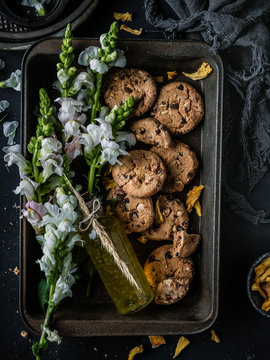 Cookies in baking sheet with flowers