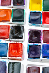 Colourful Watercolour Pallet of Messy Used Half Pan Paints