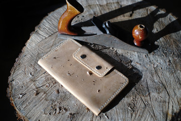 leather wallet, woodwork