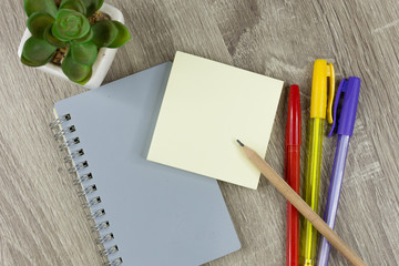 Set of office supplies for work with wood texture background