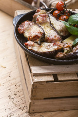 Baked eggplant stuffed with mozzarella cheese and tomatoes