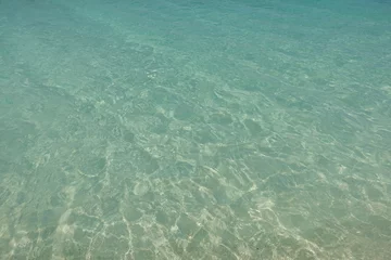 Photo sur Plexiglas Anti-reflet Plage de Seven Mile, Grand Cayman View of clear blue water on the Seven Mile Beach, a landmark sandy beach in Grand Cayman island