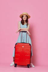 young woman with suitcase