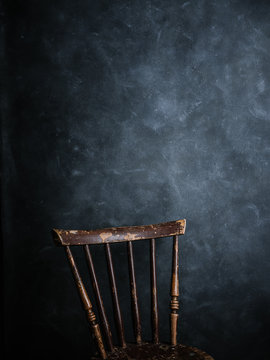 Chair On A Blue Dark Background For Text