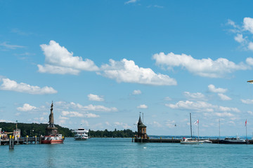 large passenger boat enters the historic harbor at Konstanz on Lake Constance