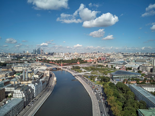Moscow, Park Zariadye, soaring bridge, Panoramic aerial view from drone of the Moscow center near Kremlin in summer.